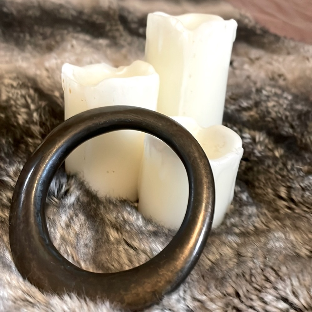 Good as new asymmetrical metal bangle from Holt Renfrew